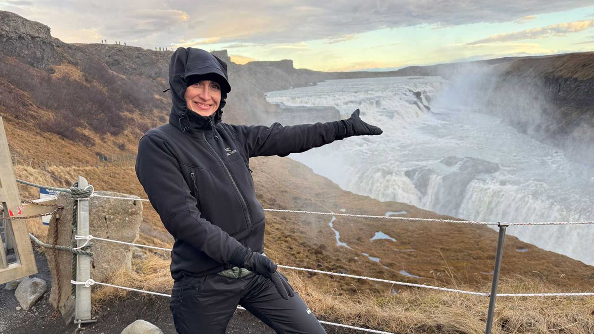 Iceland-woman-waterfall